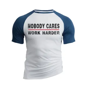 NOBODY CARES WORK HARDER 100% COTTON RAGLAN GRAPHIC TEE